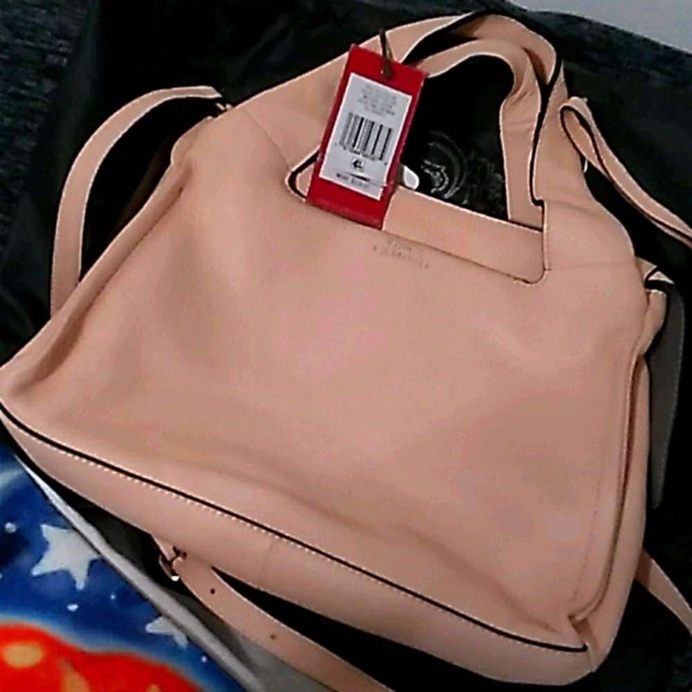 Light peach 🍑 color vince Caputo purse